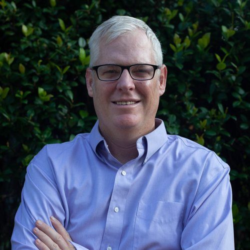A headshot of David Robertson